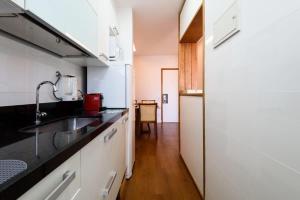 Flat com varanda, vista mar e Cristo