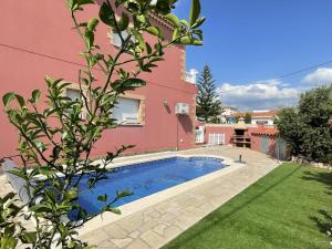 Casa Adosada en Miami Platja con Piscina Privada - ES-384-15
