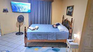 Habitación indpte para 3 personas con baño privado y patio