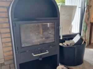 Ferienhaus-mit-Kamin-grossem-Garten-und-Strandnaehe