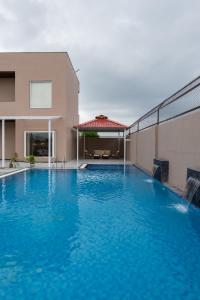 ELIVAAS Signature Casa Horizon 6-BHK Villa with Private Pool, Spacious Lawn, Terrace & Poolside Gazebo