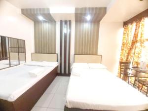 OYO 924 Cosmo Hotel Espana Near Ust