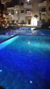 OCEAN PARK , fully furnished one bedroom flat nearby paloma beach for families and married couples only للعائلات و المتزوجين فقط , with free access to the swimming pool in the compound