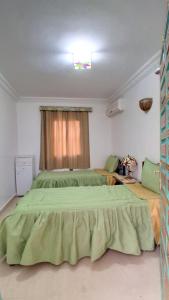 Riad Entier Au village touristique avec piscine