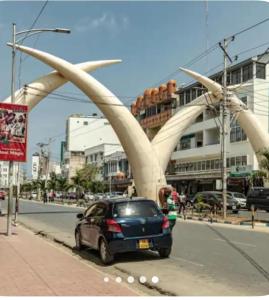 Pwani 2BR near Beach & City, AC, Pool & Fast WiFi
