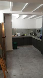 Casa Tinto Hostal - Habitación con cama matrimonial sin aire acondicionado