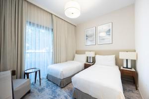 Bloomfields 3BR plus Maids in The Address Beach Resort