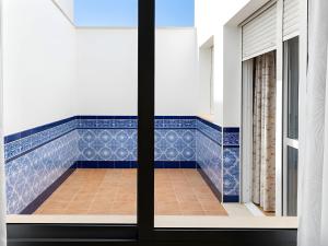 Apartamentos Tranquilos Conil Facil Aparcamiento con patio interior solo capetamos familias y parejas