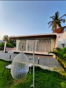 Boho sunset glass house nandi hills