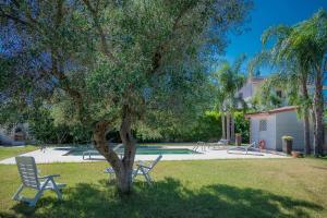 Villa IslaMaris con Piscina nel Boomerang Village a Torre Colimena