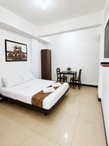 Metrohive Apartment - Cozy Studio Near NAIA Airport & PITX