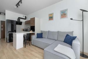 Functional Apartment with Gym & Sauna by Noclegi Renters