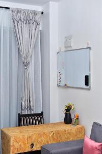 The Sunset Nest Modern 1BR at Tsavo Sunset 2