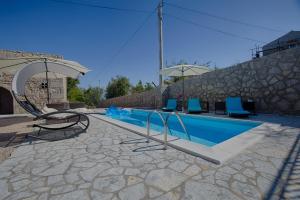 Modern villa with pool, quiet aria, privacy, nice garden - by TRAVELER Krk agency ID 2138