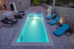 Modern villa with pool, quiet aria, privacy, nice garden - by TRAVELER Krk agency ID 2138