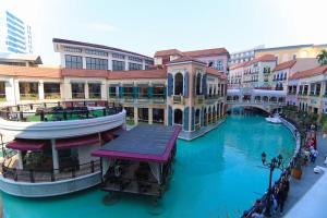 Casa Menuchah at Venice Luxury Residences with access to Venice Mall, near BGC & Airport