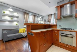 Bright Grey Apartment in Sopot Close to the Beach by Noclegi Renters