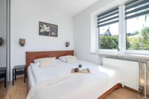 Przestronny Dom z Ogrodem i 3 Sypialniami we Wieliczce by Noclegi Renters