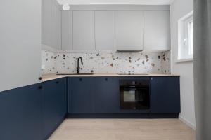Family Apartment in the City Centre with 2 Bedrooms by Noclegi Renters