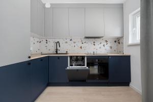 Family Apartment in the City Centre with 2 Bedrooms by Noclegi Renters