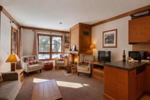 Arc 1950, Appartement 4 chambres Duplex, Cheminée, 10 pers, Vue Montagne, Sauna, Hammam, Jacuzzi, salle de fitness, Piscine extérieure chauffée