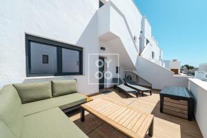 Casa de Adamant - Ground floor resort apartment with BBQ, shared jacuzzi and pool by OYOOSTAYS