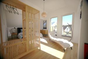 Two-story apartment with a loft-style flair - Mechelinki