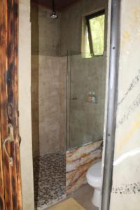 15 minutes from Playa Samara, between the sea and the forest