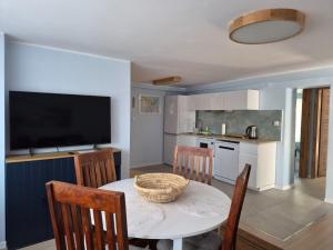 Apartament "Przez las na plażę"