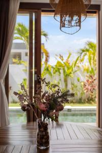 Vibrant Tropical Sanctuary, Charming 2BR Villa