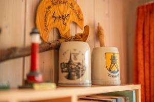 6 Personen Ferienhaus in direkter Seelage mit Bootsteg und Kanu sowie Sauna, Whirlpool und Kaminofen in Otterndorf