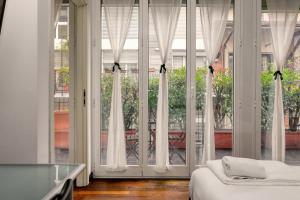 The Cozy Terrace Suite - Isola District