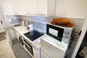 Spacious 2BR Steps from Metro, AC & Gated Parking
