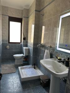 Nunus Central Apartment