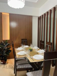 The Infinity Tower in BGC, 2BR City View with Parking by Alex Home