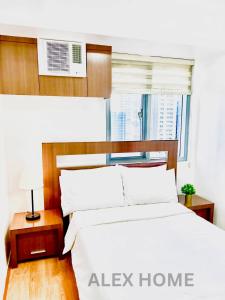 The Infinity Tower in BGC, 2BR City View with Parking by Alex Home