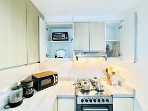 The Infinity Tower in BGC, 2BR City View with Parking by Alex Home