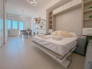 Bright Studio with AC and Balcony by Host Hero