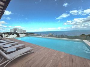 Condo across de beach, Rooftop, Pool, Great location, Takh