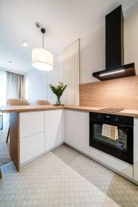 Apartament Vidok 216 by Warmia4Rent, z widokiem na jezioro