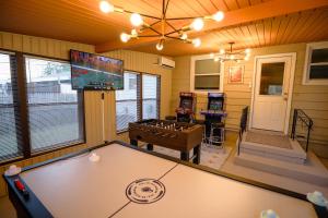 Midwest Escape Hot Tub Theater Game Room Poker Table