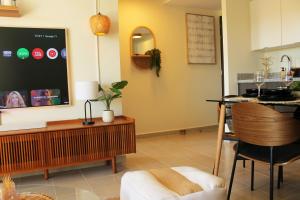 L9 Cozy Stay with Rooftop, Gym Access and Coworking