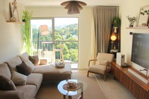L9 Cozy Stay with Rooftop, Gym Access and Coworking