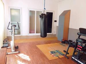 Appartement cosy avec accès à une salle de sport