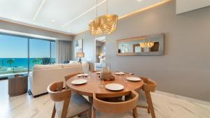 Stunning Beachfront 3BR Condo with Panoramic Ocean Views and Private Balcony