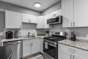 Luxurious 2-Bedroom Abode with Elevated Comforts Near Main Street