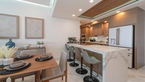Beachfront 3BR Condo with Dual Balcony Access & Spacious Open Living