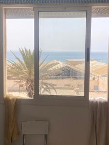 شقة على شاطئ انزا 2دقيقتان للشاطئ Apartment nearby the beach