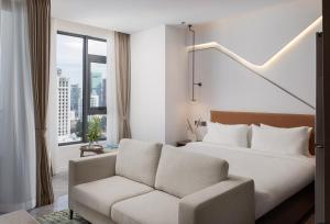 Hotel Rooms, Suites & Residences with Stunning City Views at Bassac Signature