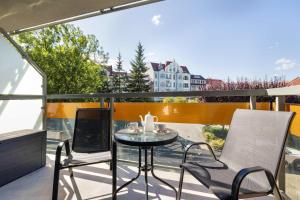 Modern Apartment in the City Centre with a Balcony by Noclegi Renters